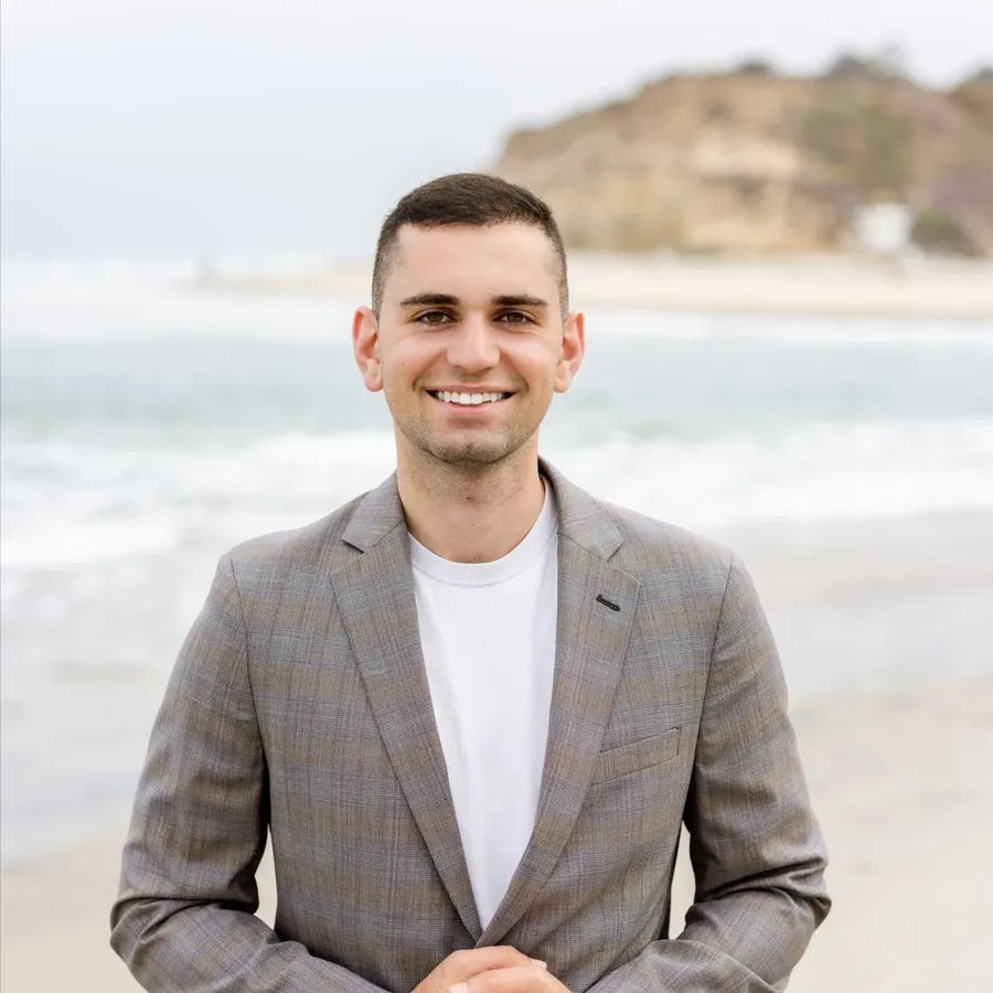 Zachary Mansour, owner of Rancho Roofing, at the beach in North County San Diego